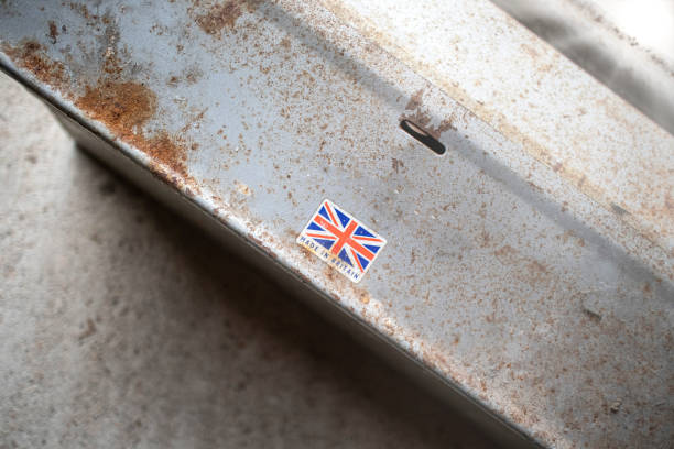 istock Well used, weathered rusty metal toolbox with an old 'Made in Britain' sticker on. 1422169043