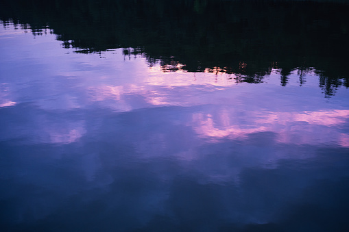 Evening mood reflected in the water of a lake in Mecklenburg-Vorpommern, Germany