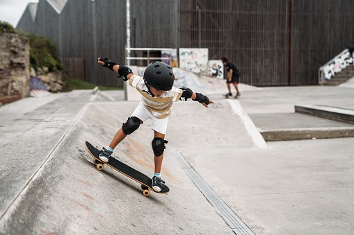 Boy skating in a skate-park