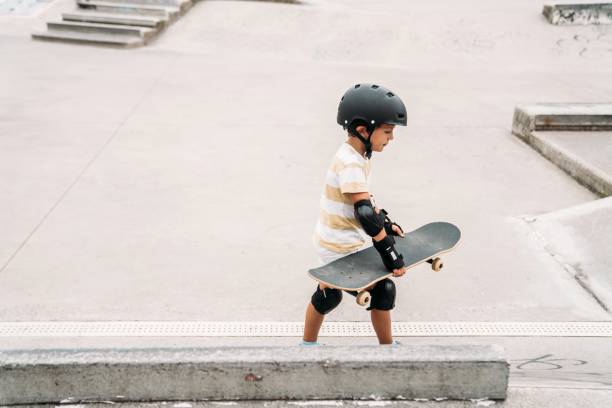 istock Boy skating in a skate-park 1422178994