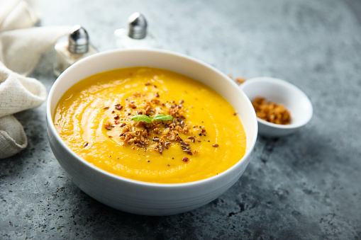 Traditional pumpkin soup with crunchy onion