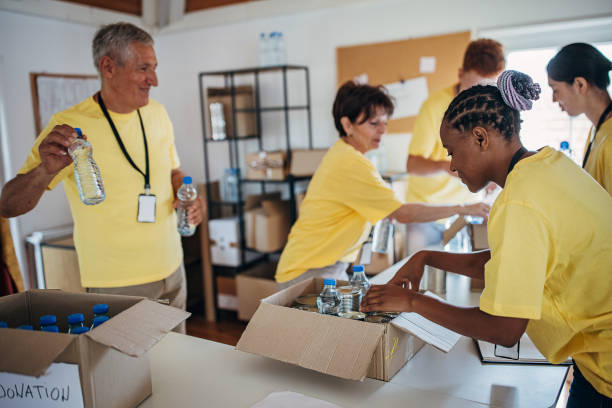 istock People working for charity together 1422179663