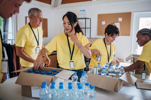 istock People working for charity together 1422180284