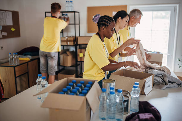 istock Volunteers working for charity 1422182085