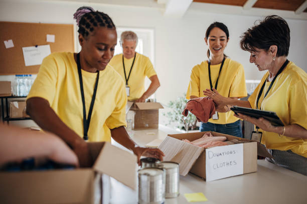 istock Volunteers working for charity 1422182649