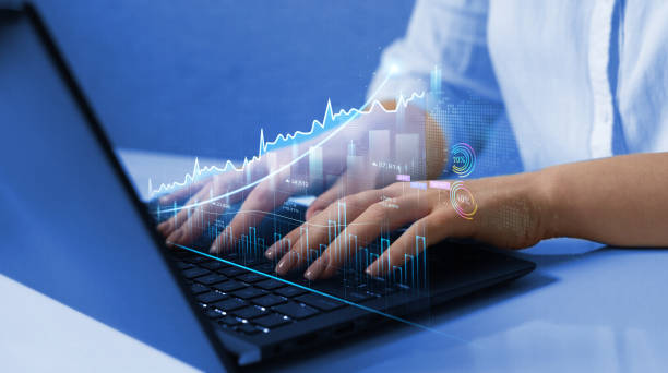 istock Virtual hologram of statistics, graph and chart.Business strategy development and growing growth plan. Investment of growth on currency rate. 1422183406
