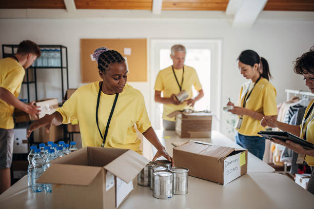 istock Volunteers working for charity 1422183531