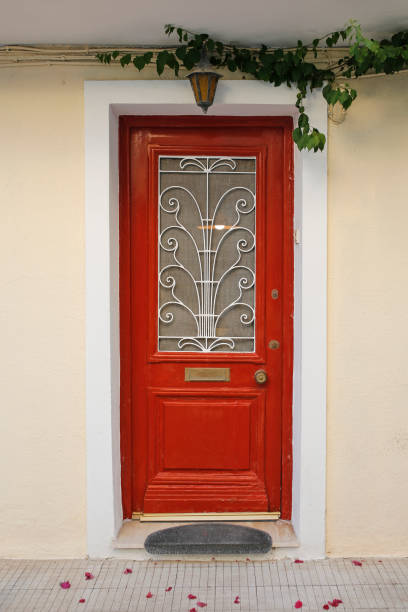 istock greek house with red door 1422188093