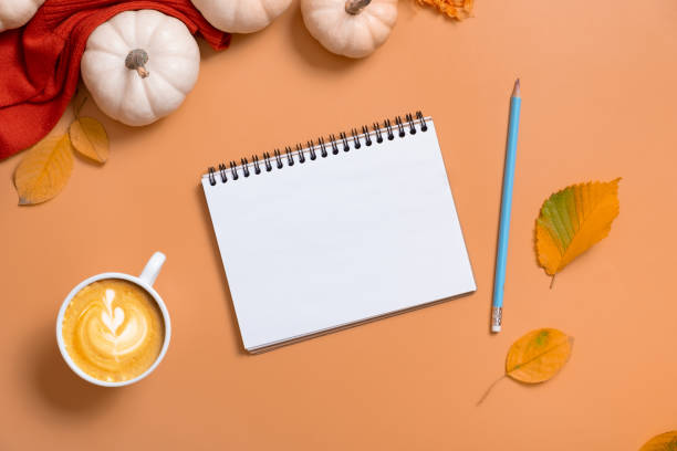 istock Blank notebook for text and pumpkins with autumn leaves. Autumn theme mock up 1422188204