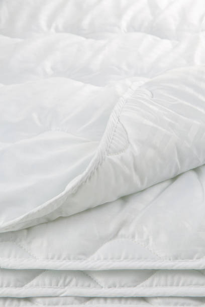 istock bed linen pillow and blanket made of quilted fabric with sewing and processing features 1422192882