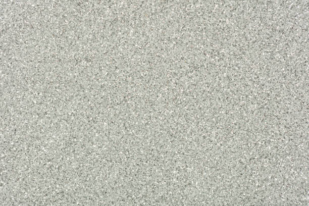 istock Glitter background, texture in light tone for different stylish design. 1422195544