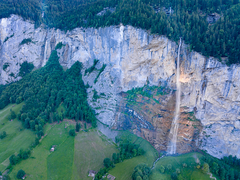 Unique Aerial night shot of the famous Staubbach Falls, Trümmelbach Falls, Lauterbrunnen Valley, Switzerland