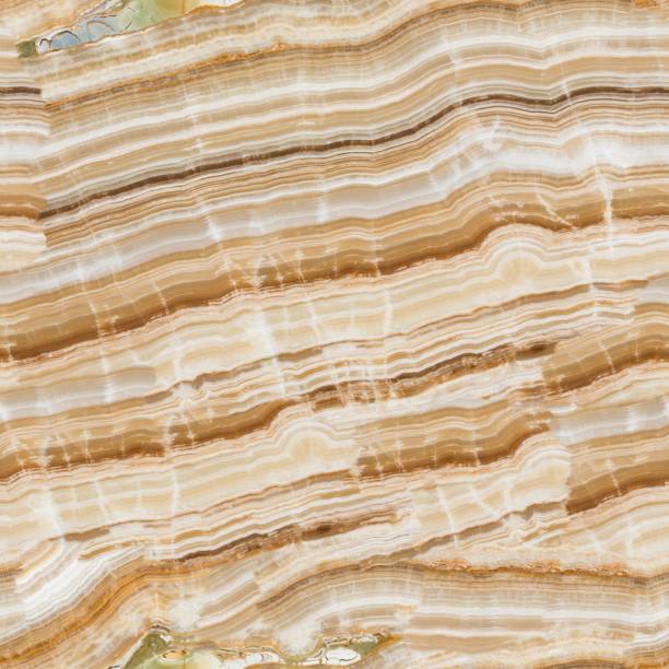 istock Onyx texture of natural stone. Seamless square background, tile ready. 1422197026