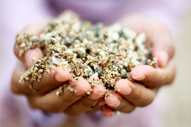 istock A handful of sand beach 1422197880