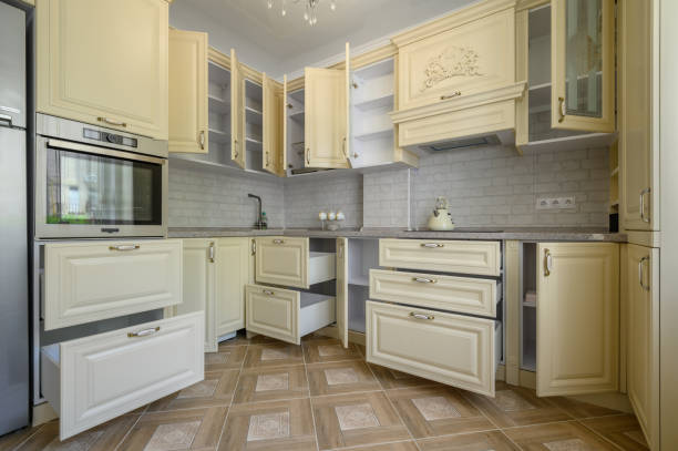 istock Interior of modern trendy cream colored kitchen 1422198834