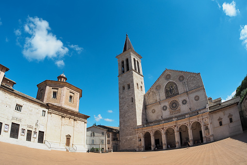 Fisheye view of Cathedral of Santa Maria Assunta in Spoleto, little city immersed in the green of Umbria in central Italy.