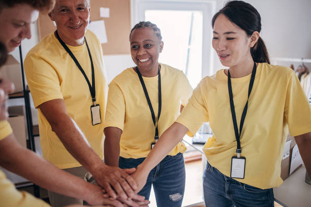 istock Happy charity volunteers 1422211816