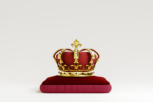 Queen or King crown on royal cushion. 3D Illustration