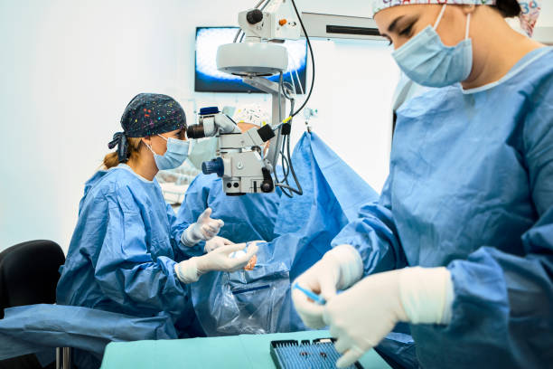 Ophthalmic surgeon working in operating room stock photo