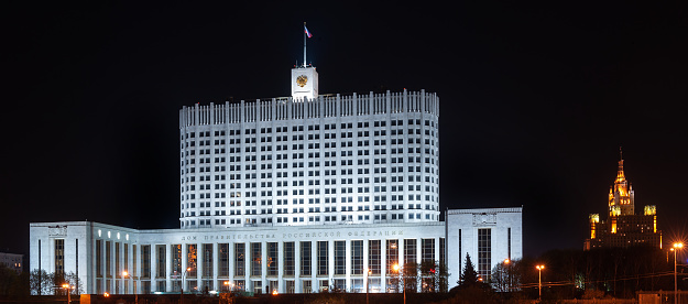 Night view of the building of the government of Russia with the inscription House of the Government of the Russian Federation