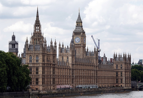 London, UK - August 1, 2022: The Houses of Parliament building on the River Thames in Westminster, London, UK.