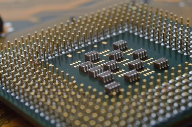 istock microprocessor from the computer lies on the motherboard. close-up. 1422221674