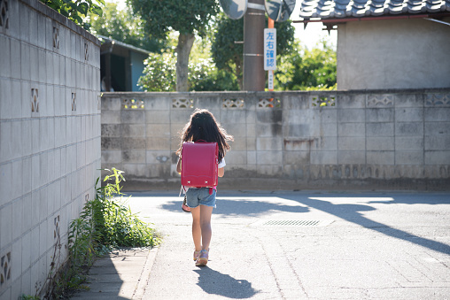 Japanese primary school girl going home