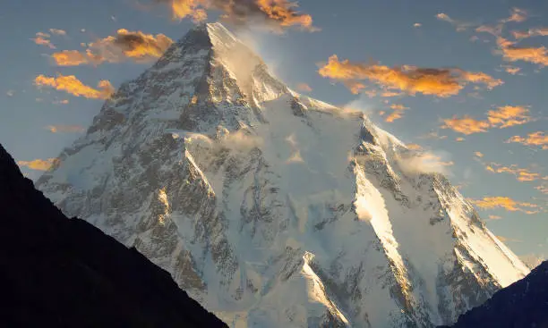 K2 peak 8'611 metres, the second highest mountain in the world during sunset
