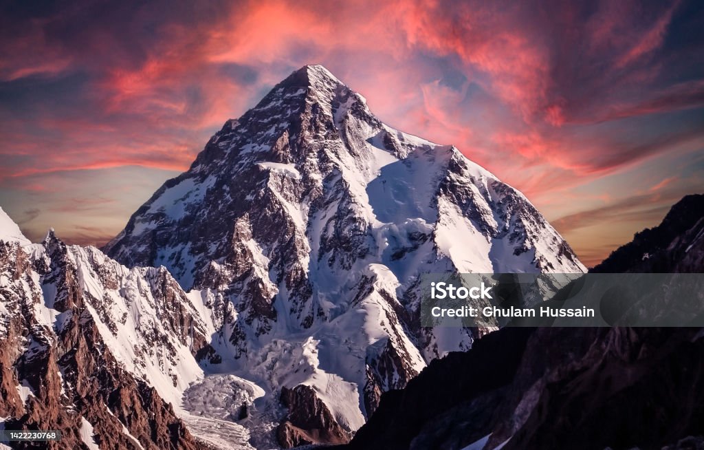 K2 summit, the second highest mountain in the world Stunning view of the K2 peak during sunset Mt. Everest Stock Photo