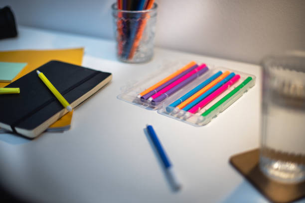 Office and school Supplies like crayons, notepad, pen, markers and rulers.