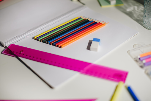 Office and school supply for math with crayons, rulers for geometry and markers and rubber.