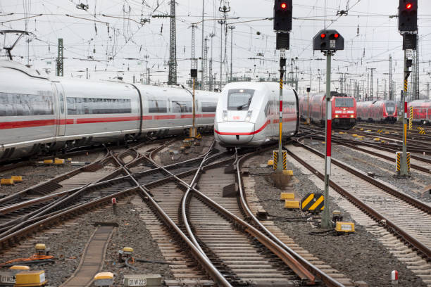 Frankfurt, Germany - December 03, 2021: An arriving ICE train at main station Frankfurt, Germany. ICE, formerly known as InterCityExpress is a highspeed train system in Germany. Deutsche Bahn AG (DB) is a national railway company in Germany and headquartered in Berlin. DB is the successor to the former state railways of Germany (Deutsche Bundesbahn).