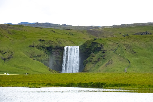 Distant Skógafoss Waterfall in Summer Southern Iceland
