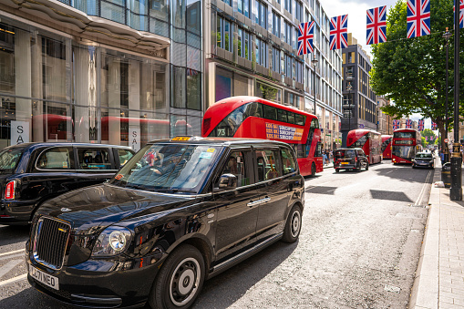 Taxi at Whitehall Place, London - England.