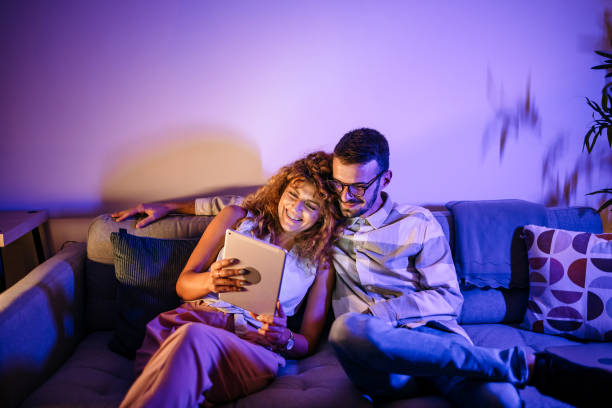 istock Couple relaxing on the sofa 1422238325