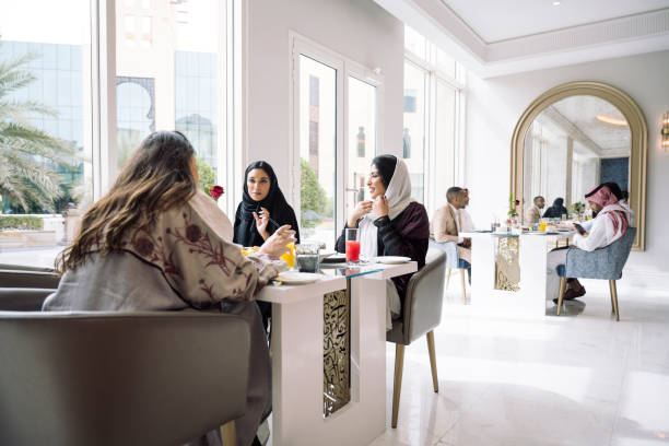 istock Middle Eastern women talking over lunch in Riyadh 1422240609