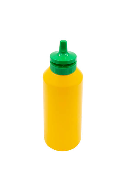 istock yellow squeeze plastic bottle for mustard isolated on white background 1422240611