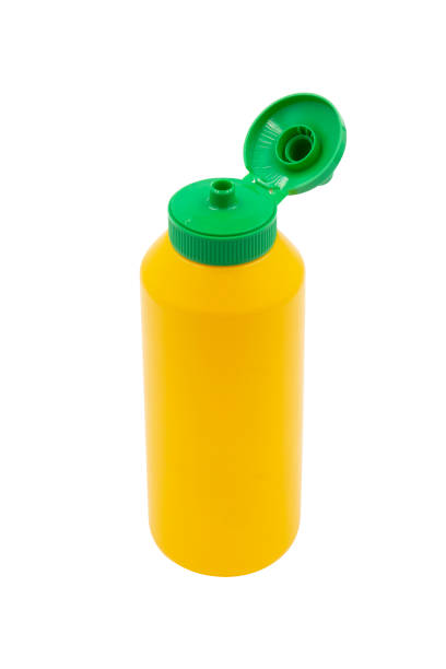 istock yellow squeeze plastic bottle for mustard isolated on white background 1422240627