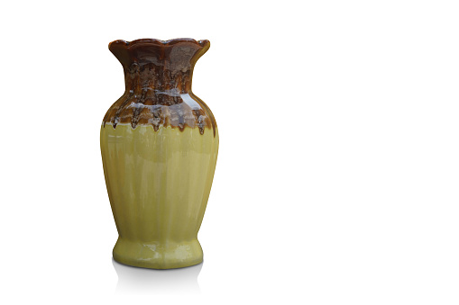 brown and yellow ceramic vase on white background, object, nature, decor, fashion, copy space