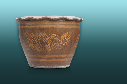 old big pottery pot on green background, object, vintage, retro, ancient, template, copy space