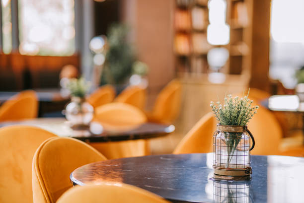 istock cozy restaurant interior design with yellow chair 1422245066