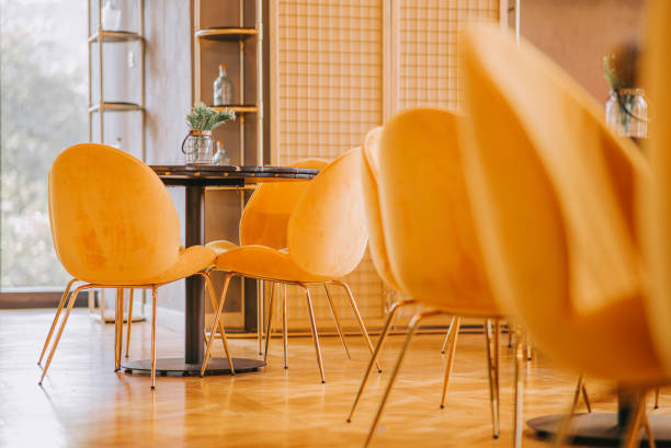 istock cozy restaurant interior design with yellow chair 1422245074
