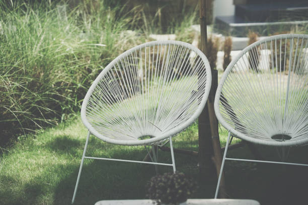 istock white wicker rattan chair in garden 1422251053