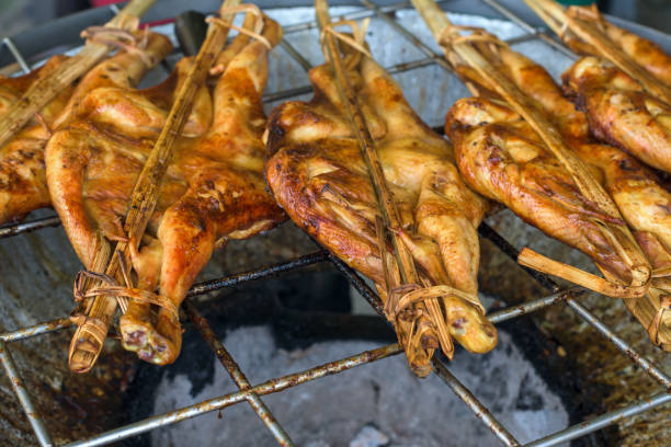 istock Grilled chicken on the flaming grill. 1422251172