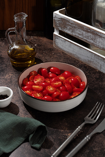 red cherry tomatoes in a plate on the table