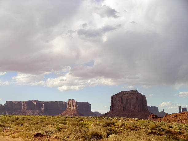 Merrick Butte - Monument Valley, Arizona Monument Valley, United States,  September 2004: Rock formations include Merrick Butte and West Mitten west mitten stock pictures, royalty-free photos & images