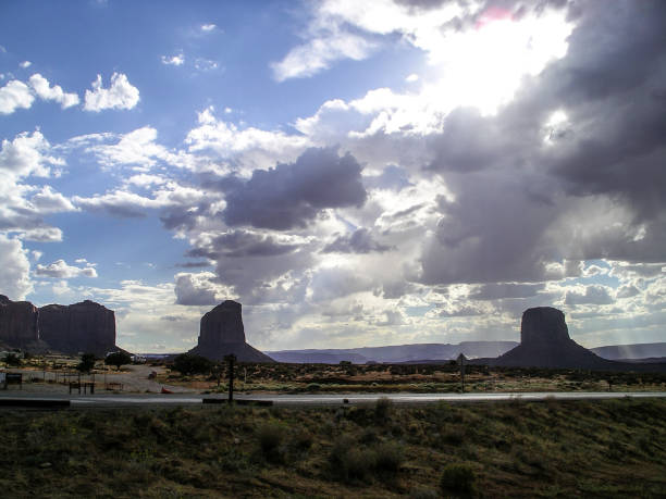 Merrick Butte - Monument Valley, Arizona Monument Valley, United States,  September 2004: Rock formations include Merrick Butte and West Mitten west mitten stock pictures, royalty-free photos & images