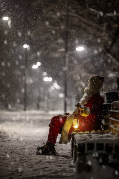 istock Santa Claus walks in nature on a snowy night 1422258364