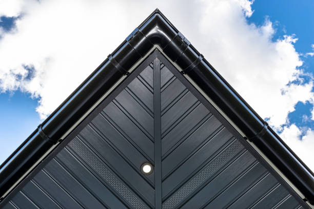 istock A modern graphite herringbone roof lining is attached to the trusses, visible turned on LED lights. 1422261188
