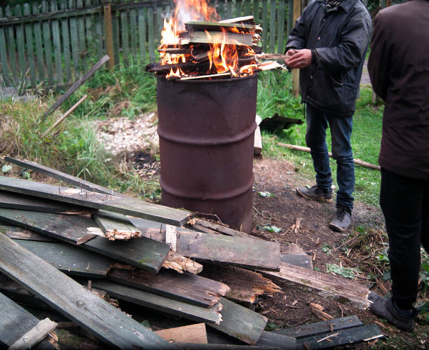 istock people warming near bonfire 1422261519